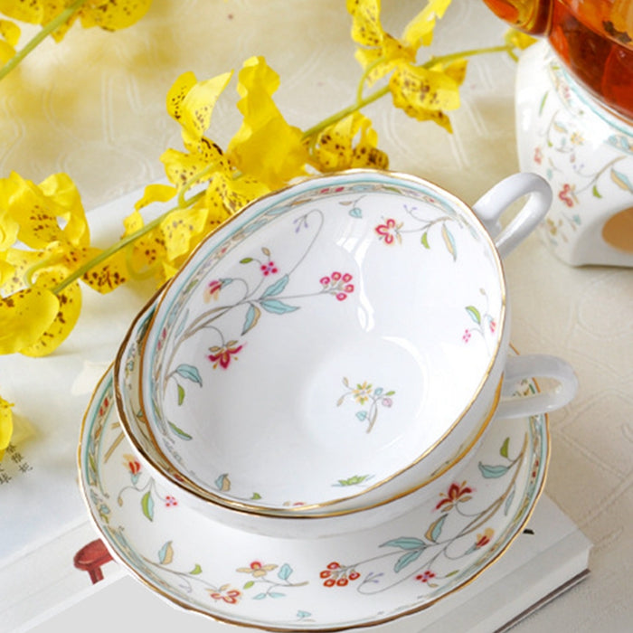 Gold-Rimmed Ceramic Tea Cup And Saucer Set