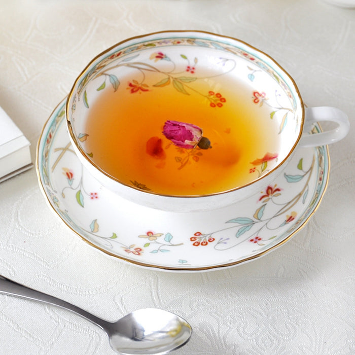 Gold-Rimmed Ceramic Tea Cup And Saucer Set
