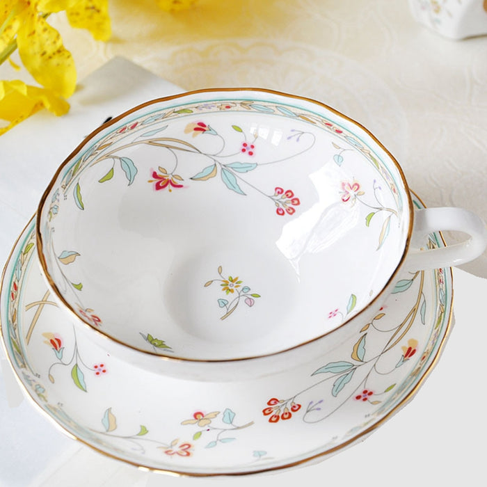 Gold-Rimmed Ceramic Tea Cup And Saucer Set
