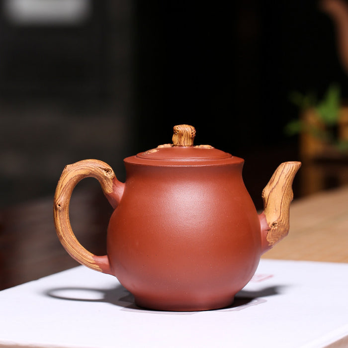 Yixing Plum Blossom Relief Zisha Teapot