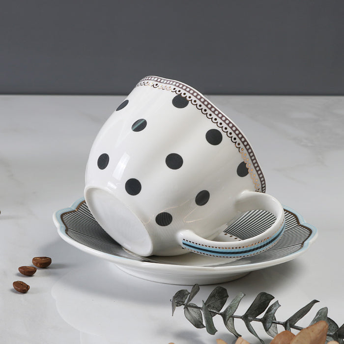 Polka Dot And Stripe Cup And Saucer Set